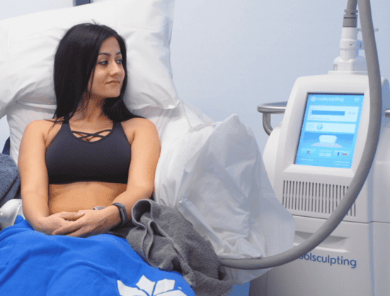 woman getting coolsculpting in grand rapids